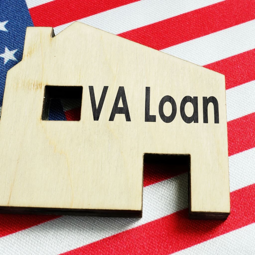 Veteran reviewing VA home loan documents and DD214 paperwork